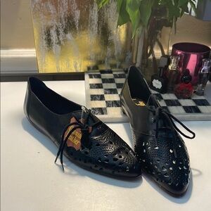 Black Flats with Glossy Finish and Broguing